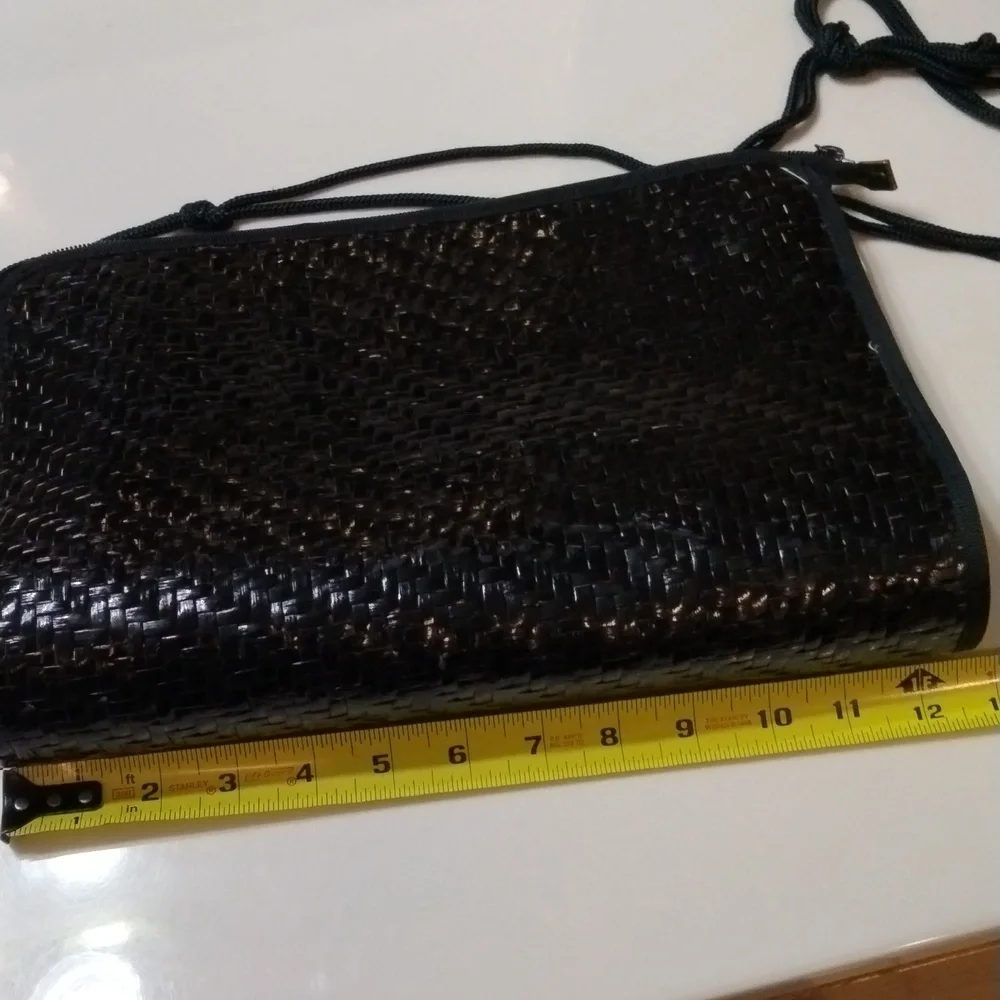 Made in Hong Kong black woven clutch